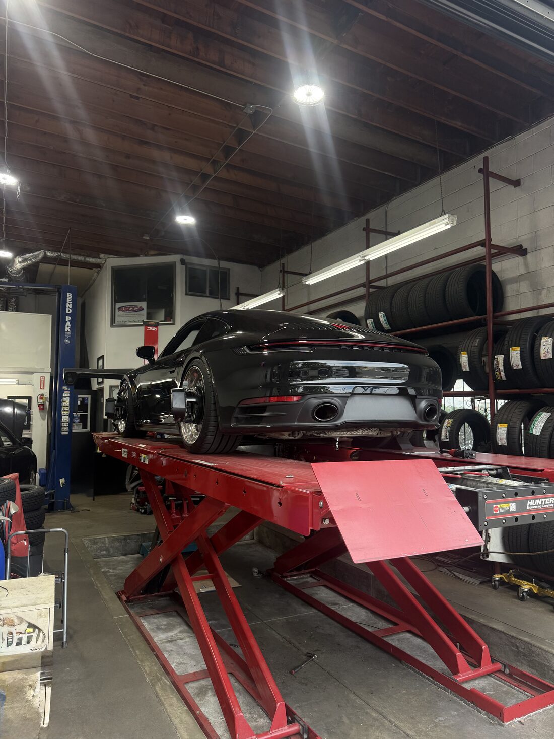 Porsche on the lift at ACE Performance